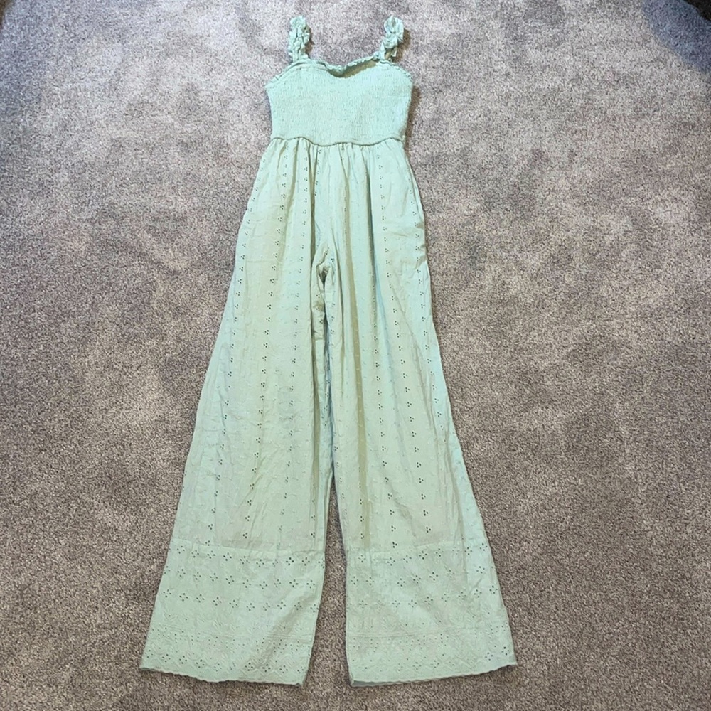 Jessica Simpson romper in mint green. Size: XS Womens. Lacy and ruffled design.